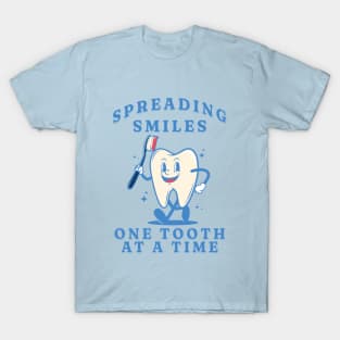 Spreading smiles, one tooth at a time Funny Retro Pediatric Dental Assistant Hygienist Office Gifts T-Shirt